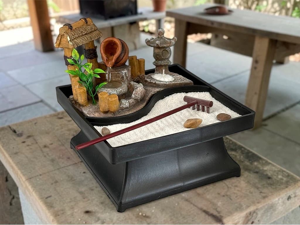 FUENTE CON JARDIN ZEN Y VELA 19 CM